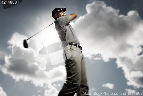 Image of golfer shooting a golf ball