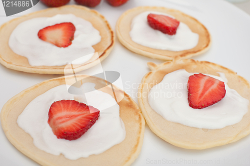 Image of Flapjacks With Strawberries and Cream