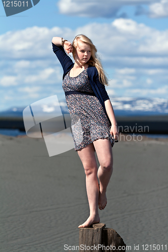 Image of girl standing on one leg