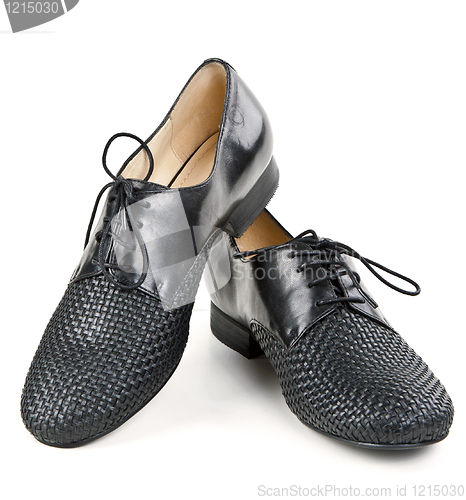 Image of stylish pair of black leather shoes