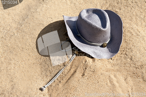 Image of purple hat with a strap