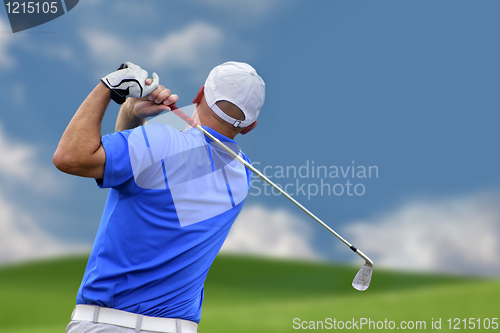 Image of golfer shooting a golf ball