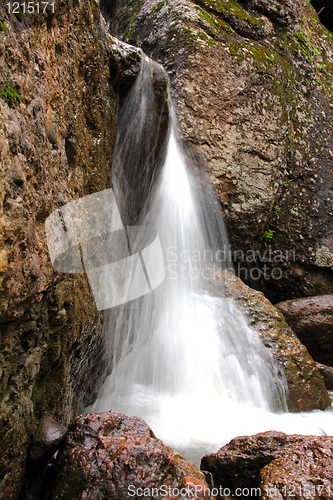 Image of waterfall among rocks close-up