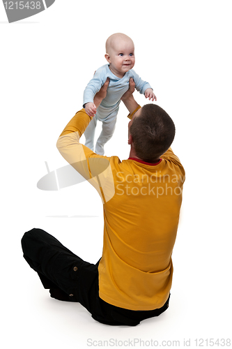 Image of Dad tosses baby