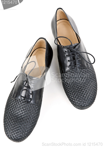 Image of stylish pair of black leather shoes