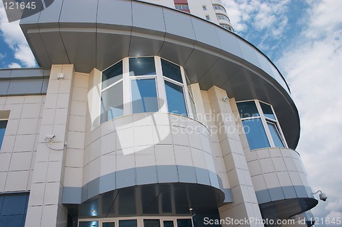 Image of Office of Bank and blue cloudy sky