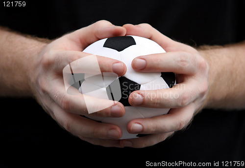 Image of Holding a soccer ball