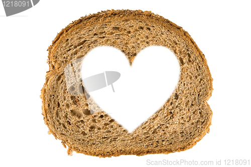 Image of Heart shaped hole in a slice of bread