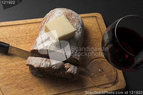 Image of bread wine and cheese