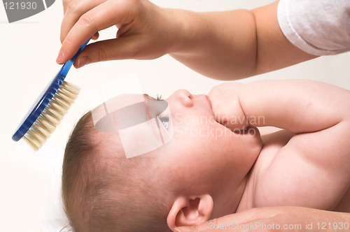 Image of comb and baby