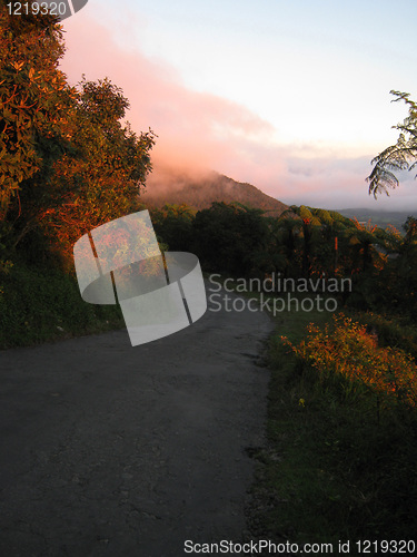 Image of Autumn forest road to the summit of the mountain