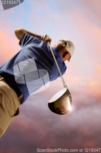 Image of golfer shooting a golf ball
