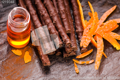 Image of chocolate sticks with orange