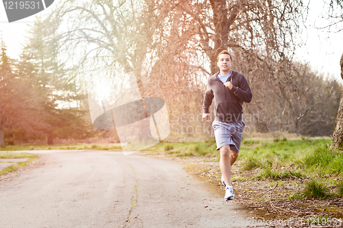 Image of Mixed race man running