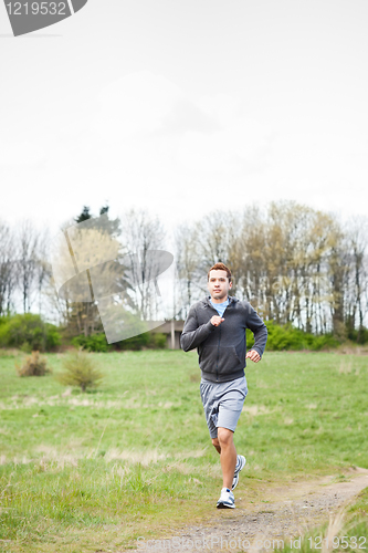 Image of Mixed race man running