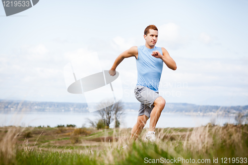 Image of Mixed race man running