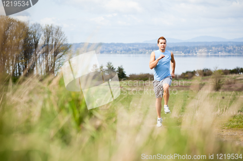 Image of Mixed race man running