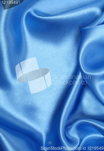 Image of Smooth elegant blue silk as background 