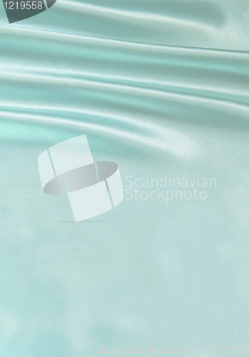 Image of Smooth elegant blue silk as background 