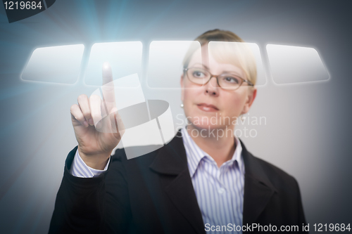 Image of Woman Pushing an Interactive Touch Screen Button