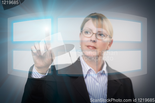 Image of Woman Pushing an Interactive Touch Screen