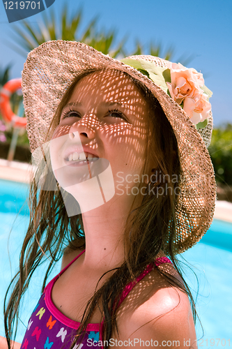 Image of Summer girl - happy 9 years old girl on summer vacation