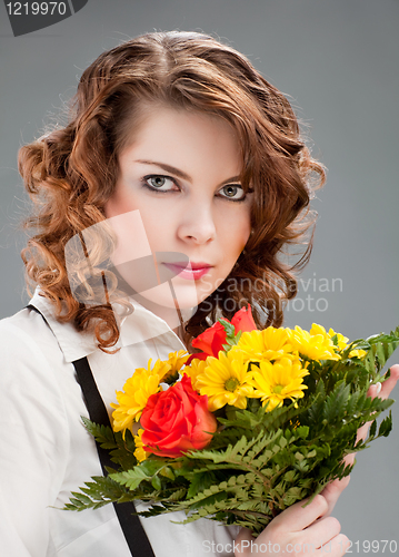Image of woman with a bouquet of flowers