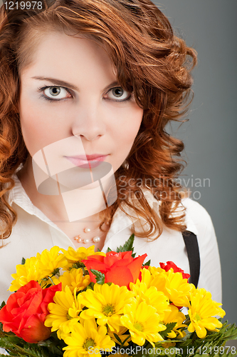 Image of woman with a bouquet of flowers