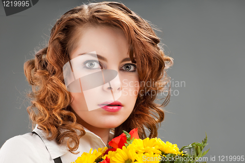 Image of woman with a bouquet of flowers