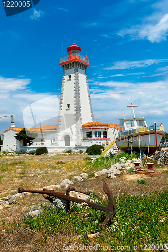 Image of lighthouse on mediterranean coastline