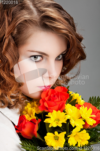 Image of woman with a bouquet of flowers