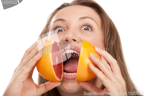Image of blond and cute girl with orange