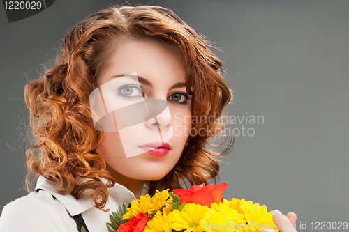 Image of woman with a bouquet of flowers