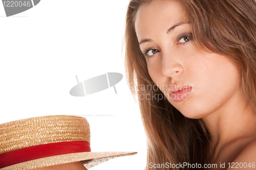 Image of blond woman and straw bonnet