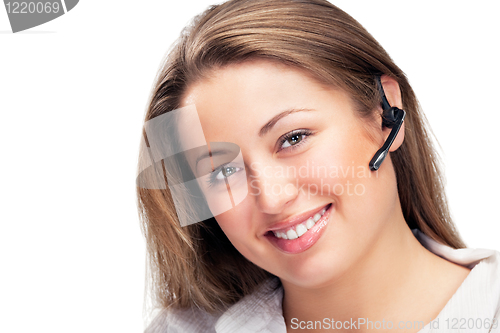 Image of young beautiful business woman with headsetling