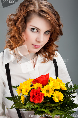 Image of woman with a bouquet of flowers