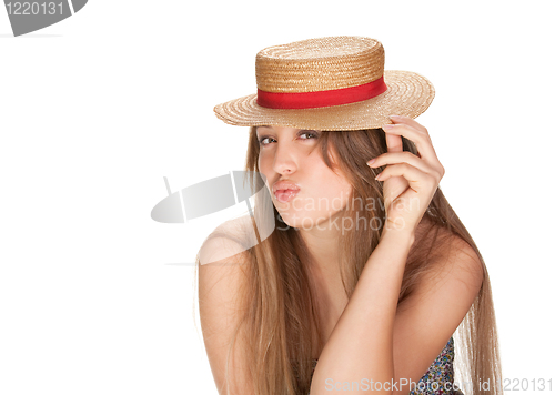 Image of blond woman and straw bonnet