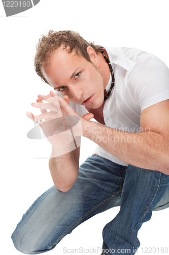 Image of Portrait of young scared man gesturing.