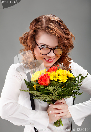 Image of woman with a bouquet of flowers