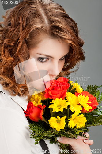Image of woman with a bouquet of flowers
