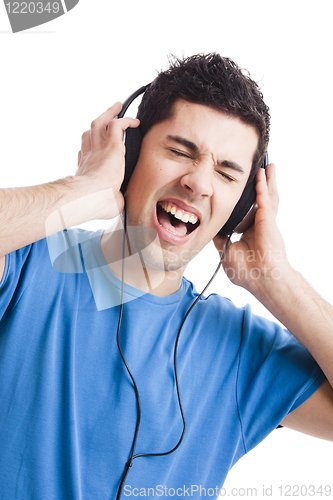 Image of Young man listen music