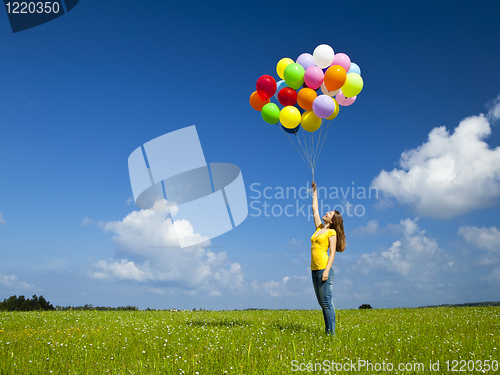 Image of Girl with colorful balloons