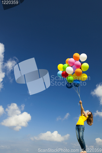 Image of Girl with colorful balloons