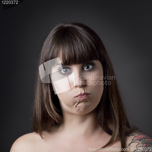 Image of Funny woman with full cheeks