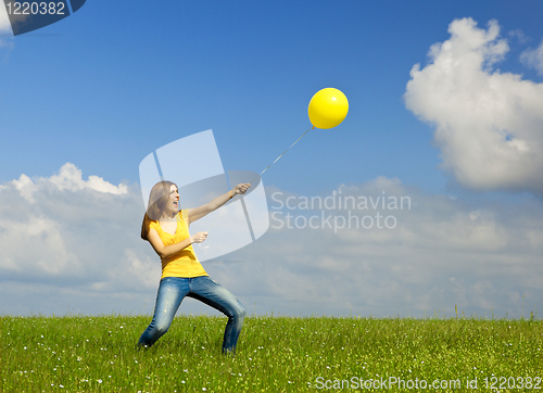 Image of Holding a balloon