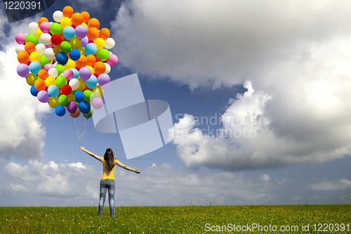 Image of Girl with colorful balloons