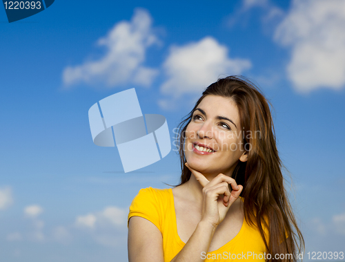 Image of Happy woman thinking