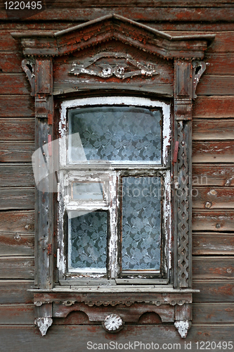 Image of window of very old wooden house