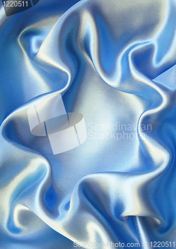 Image of Smooth elegant blue silk as background 