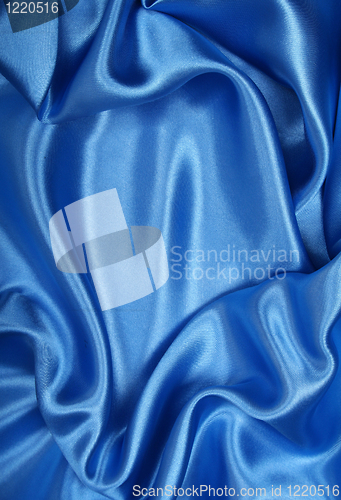 Image of Smooth elegant blue silk as background 